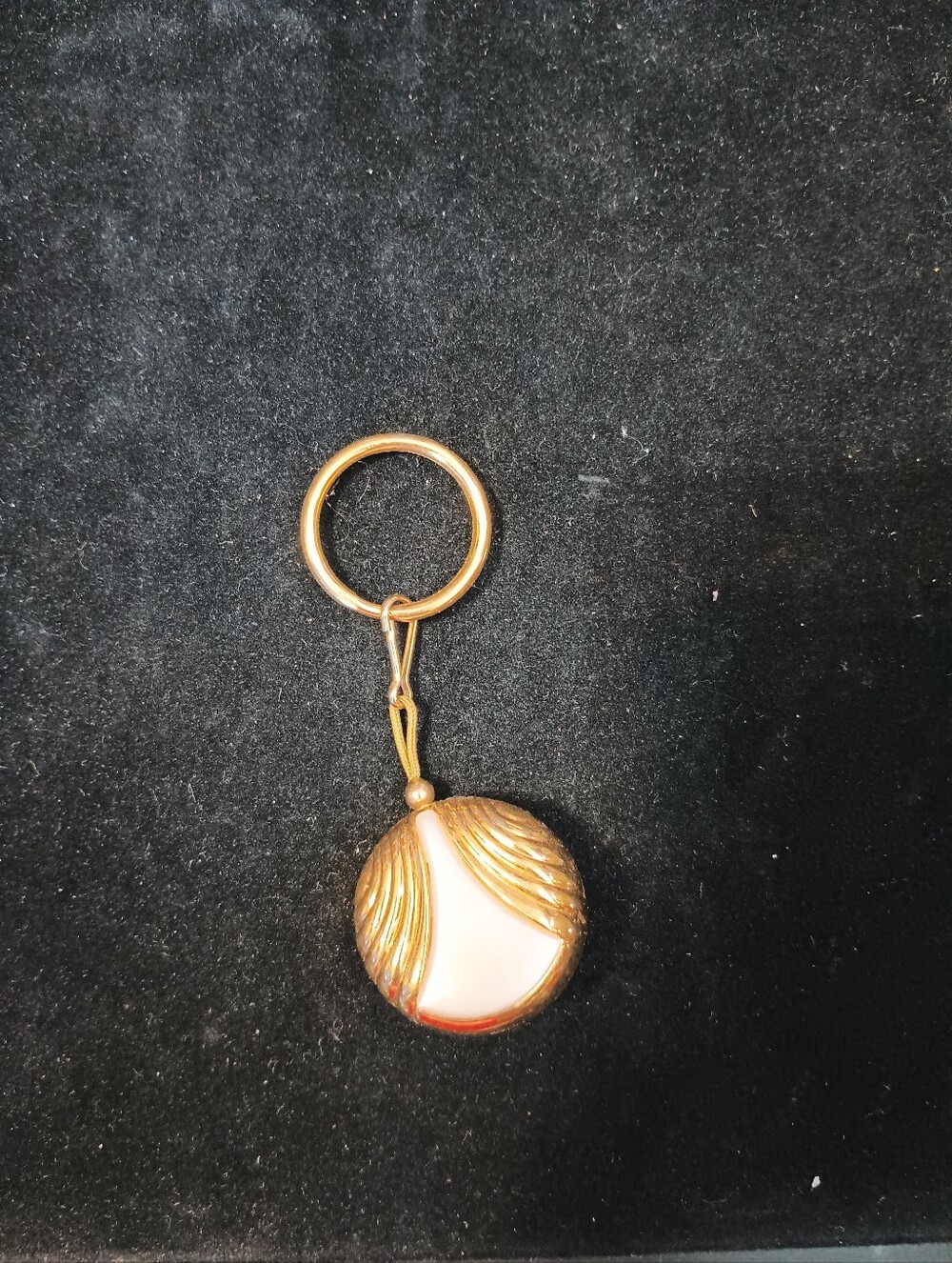 Vintage Avon Badge Reel. Gold Tone With Pearlesque Center